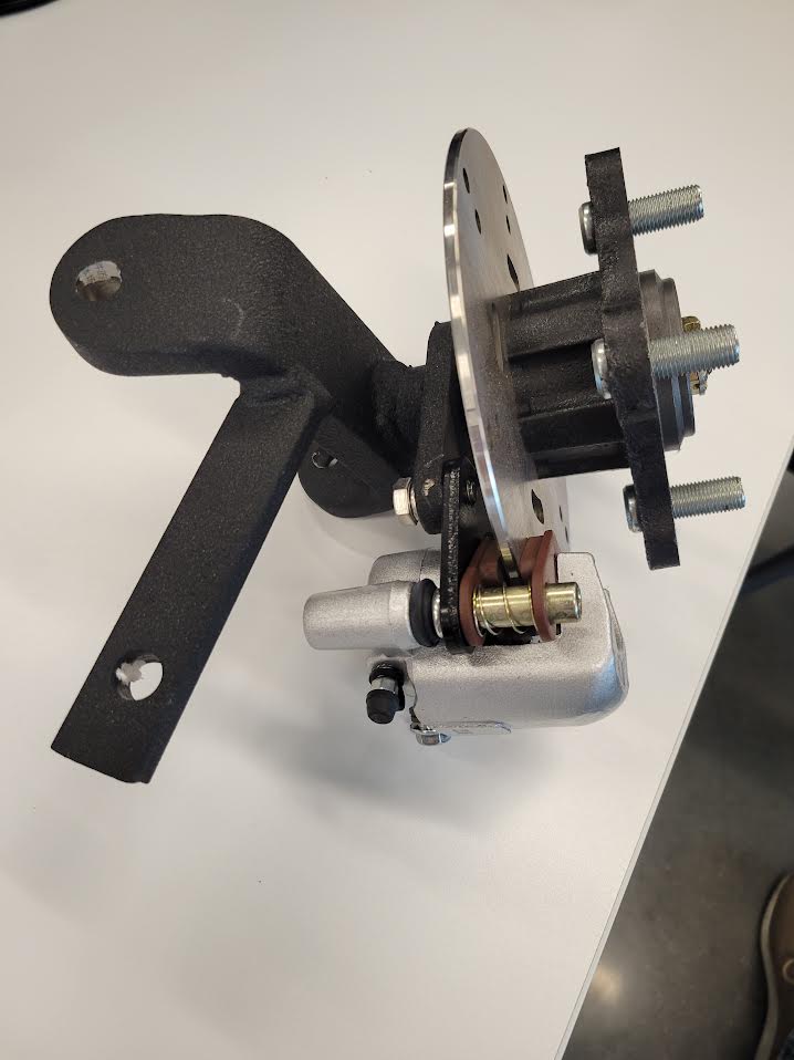 SPINDLE, FRONT, PASSENGER SIDE, WITH BRAKES, NEW STYLE PEAK/ANTHEM